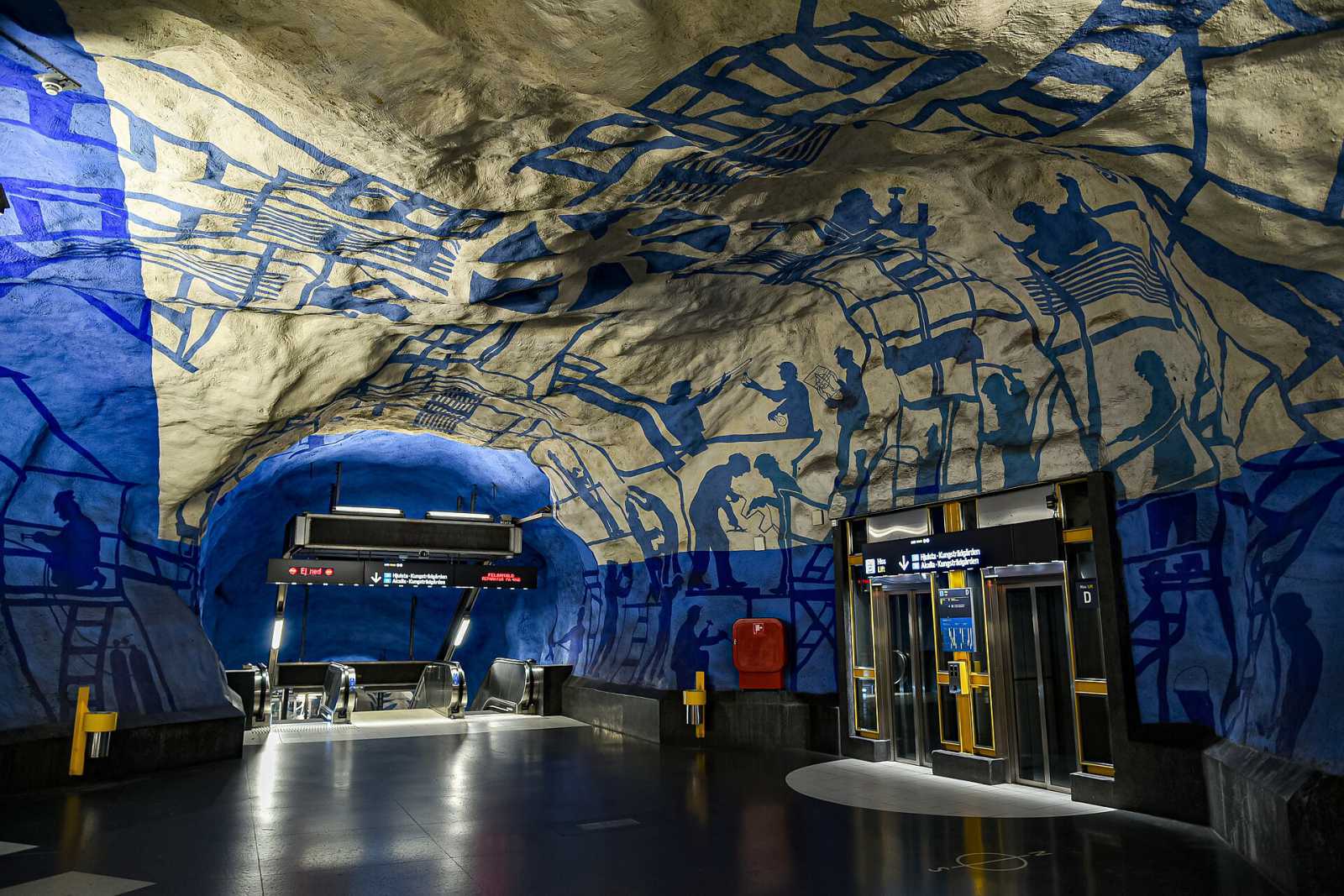 Stockholm metro art with someone who looks after it